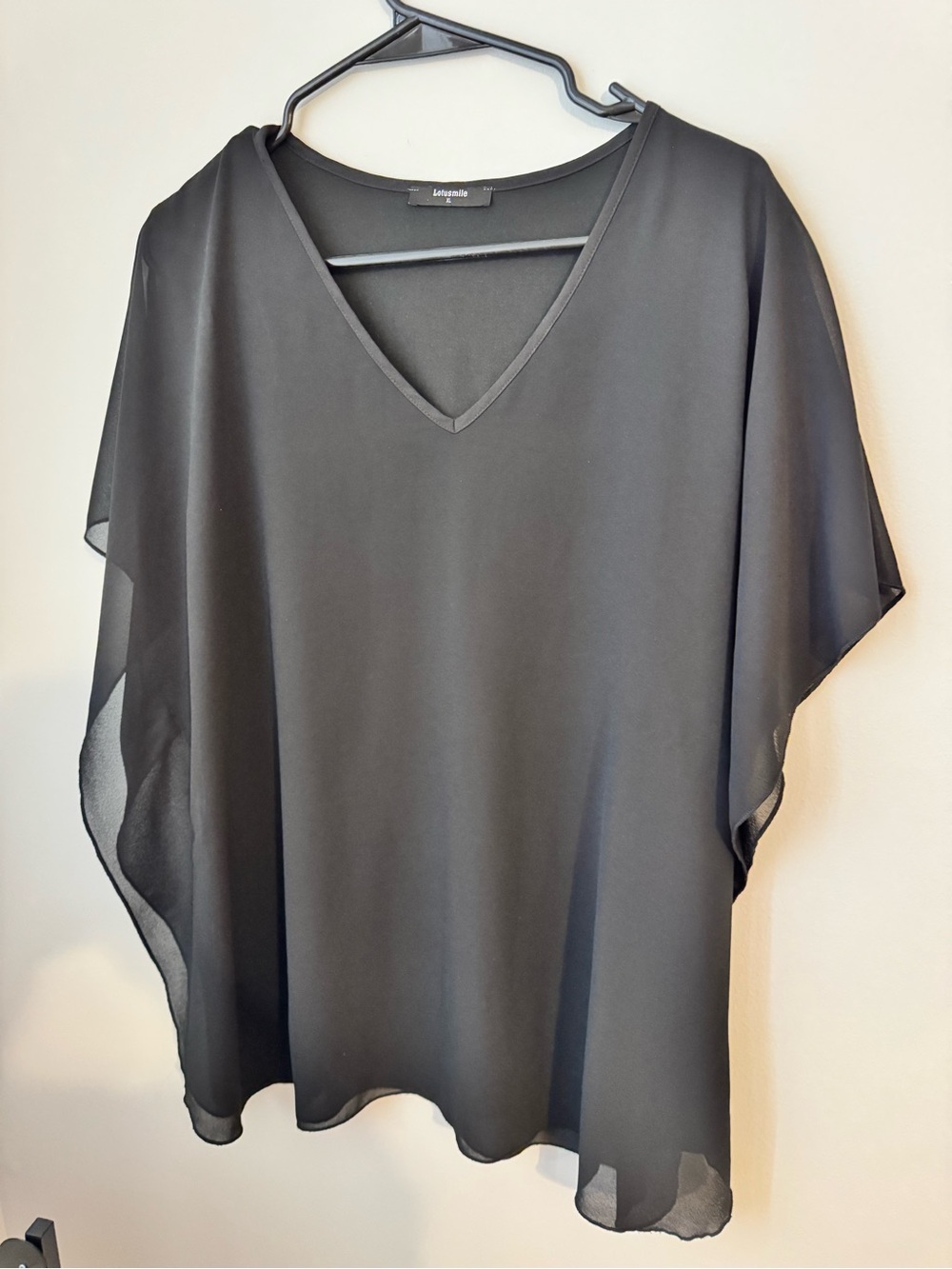 Black Chiffon V-Neck Sheer Overlay Top with comfortable stretch lining